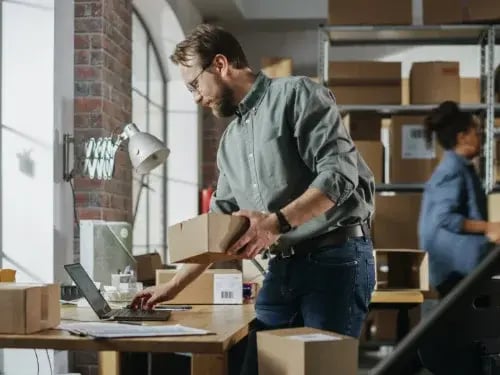man uses erp platform for ecommerce shipping fulfillment