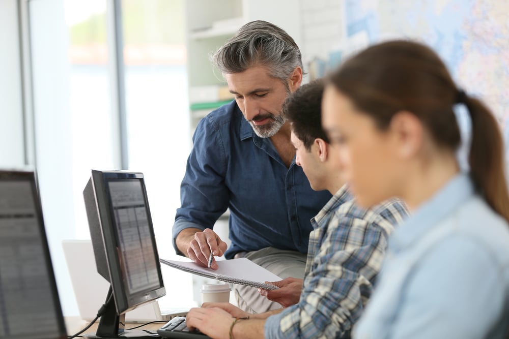 Business leader calculating opportunity cost of using QuickBooks compared to an ERP system.
