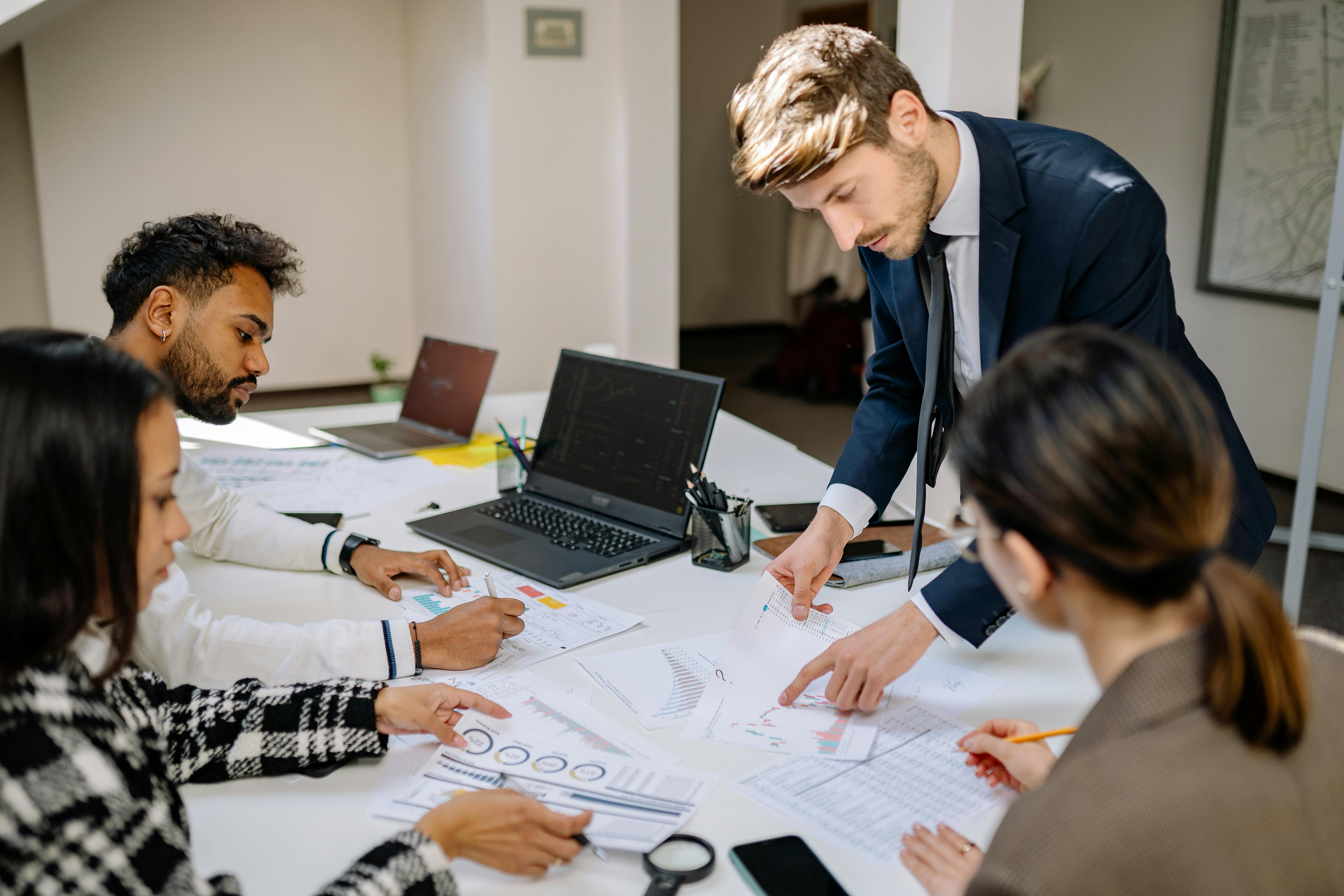 four people planning ERP implementation